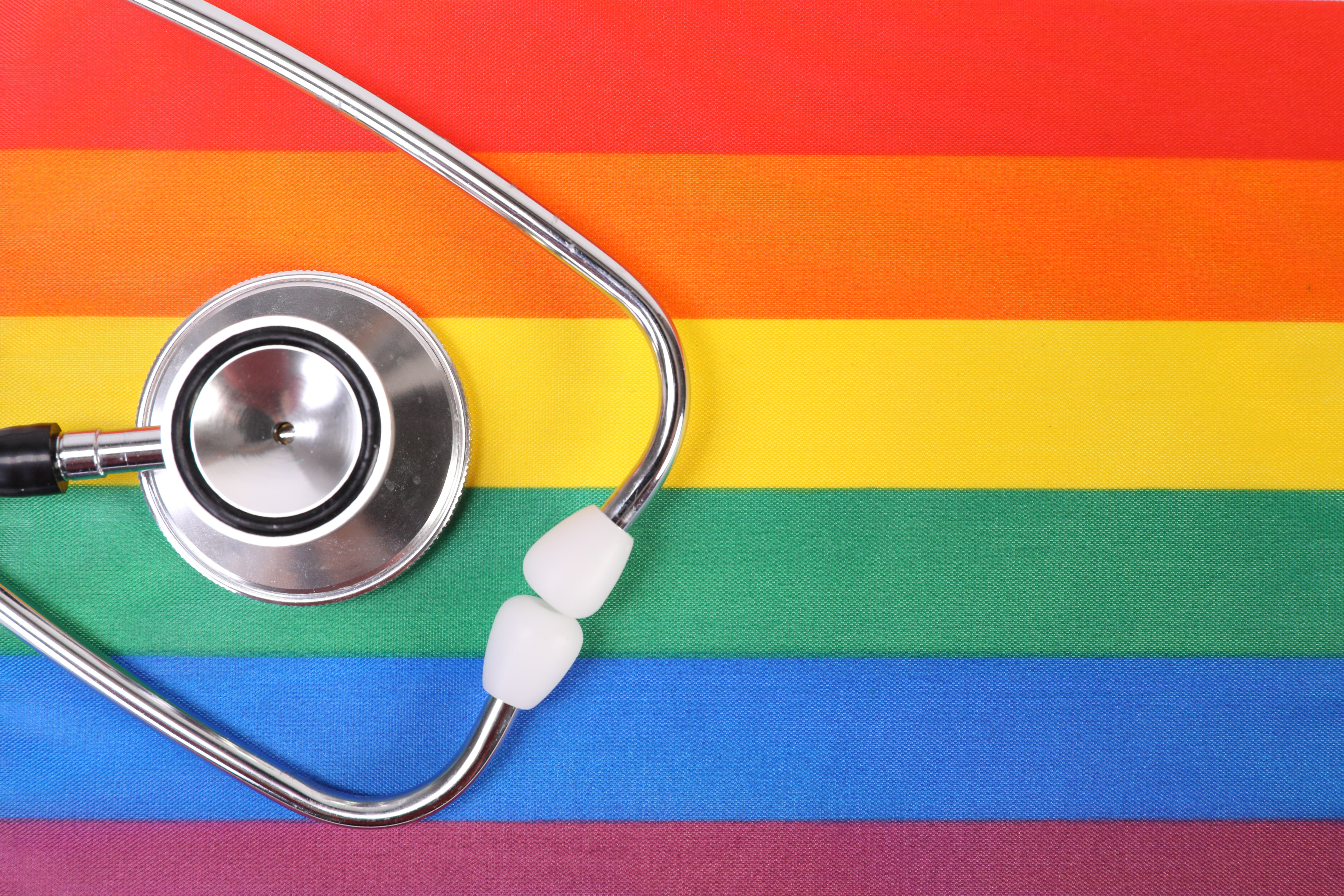 File:Black stethoscope on rainbow background, symbol of LGBT pride month  (51909867475).jpg - Wikimedia Commons