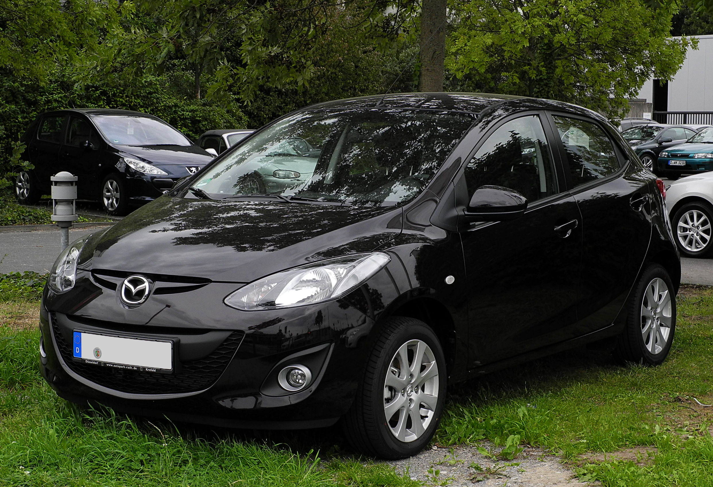 Mazda 2 отзывы. Mazda 2 2011. Мазда 2 2008 года. Мазда 2 хэтчбек 2008. Мазда 2 1.5 2008 автомат.