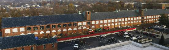 File:Long Storehouse (Building 19) of the Springfield Armory, being restored for Springfield Technical Community College.png