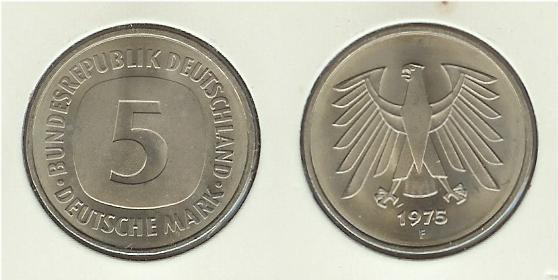 A West-German 5 Deutsche Mark (DM) coin minted in 1975. This was a common currency used in the area at the time.