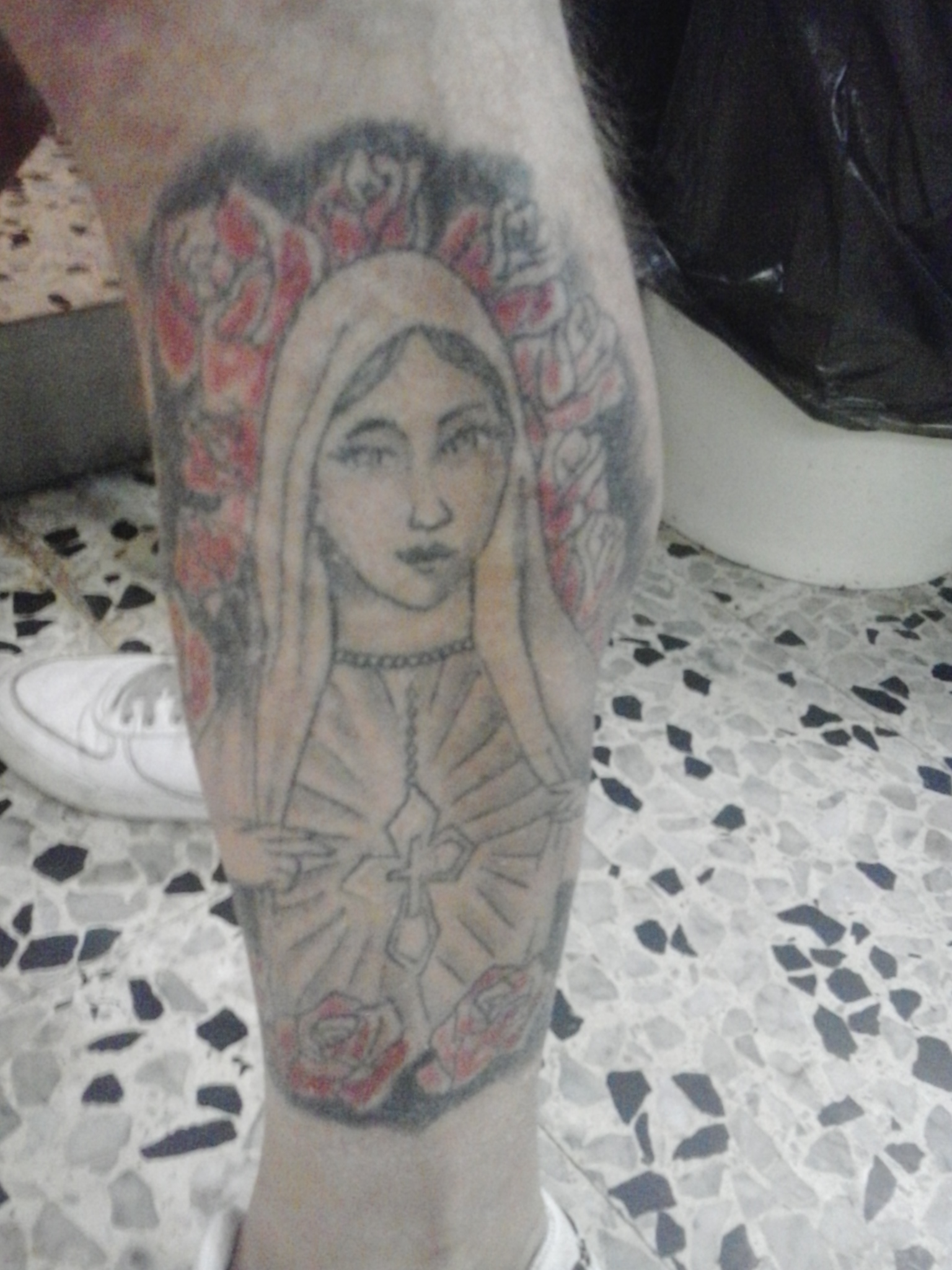 virgin mary outline tattoo