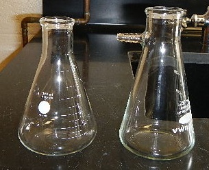 An Erlenmeyer and a filtering flask. Note the barbed sidearm on the filtering flask.