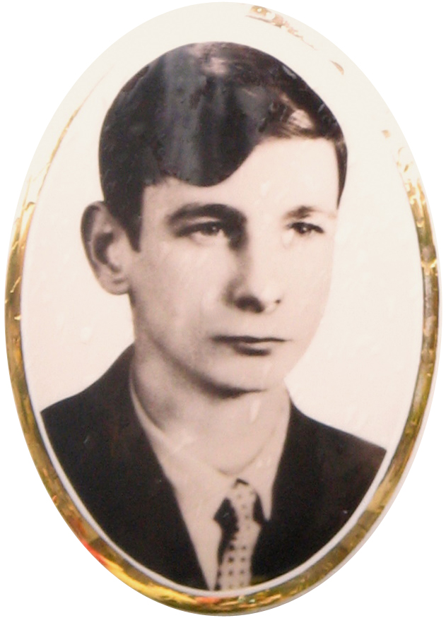 Portrait photograph of Janek Wiśniewski on his grave.jpg