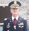 Retired Army General MD, MHA of USA Army.png