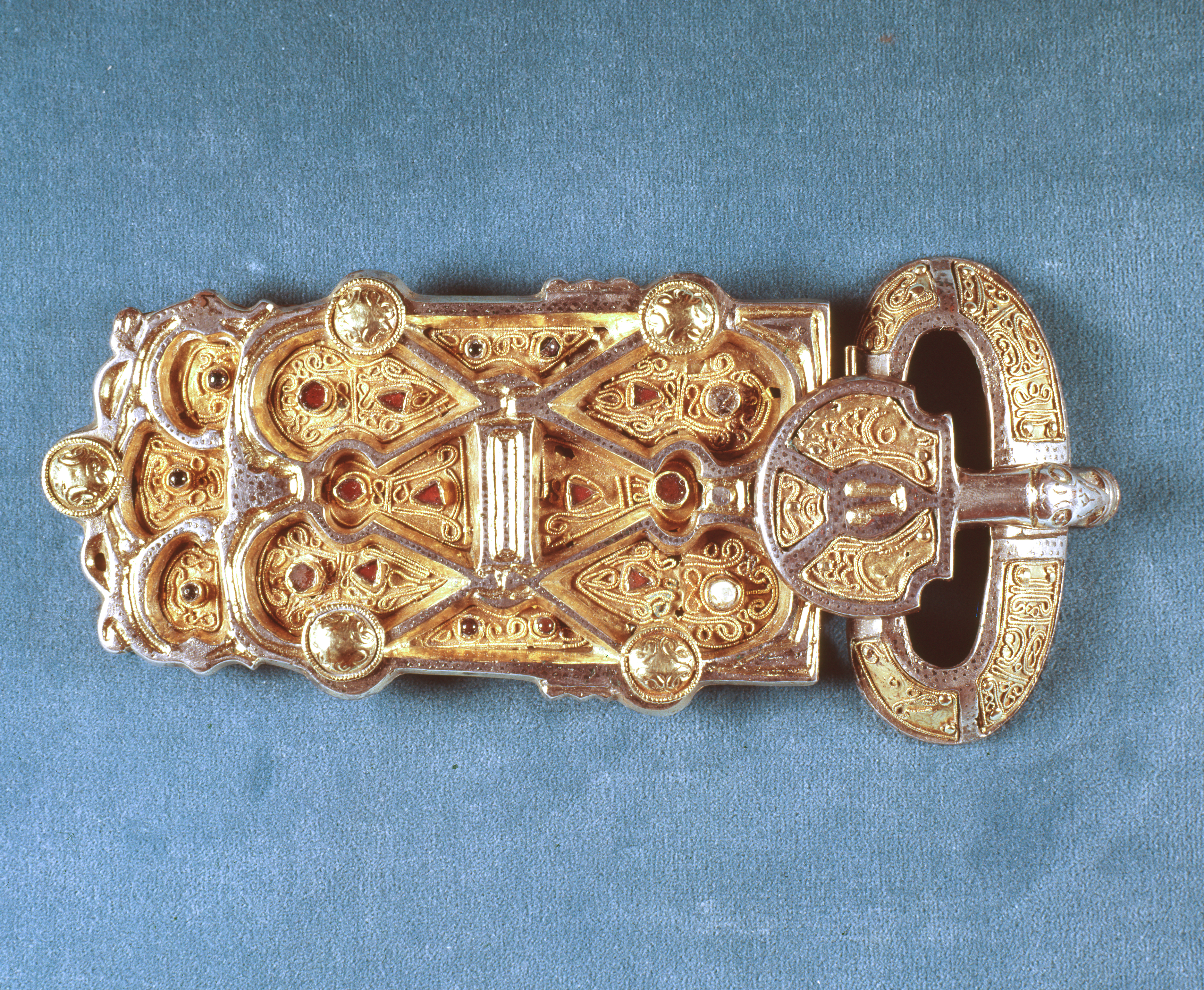Buckle plate from a jeweled belt belonging to a Merovingian woman of high status, constructed of silver, plate glass, and garnet