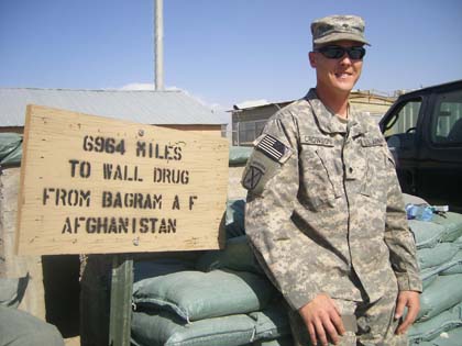 Soldier_Stand_by_Wall_Drug_Sign.jpg