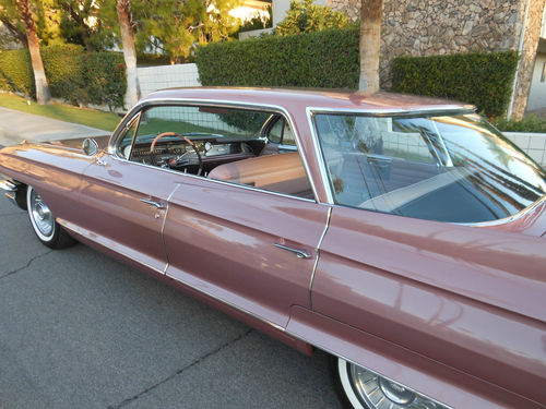 File:1961 Cadillac four window Sedan Deville Flat top rvl.jpg