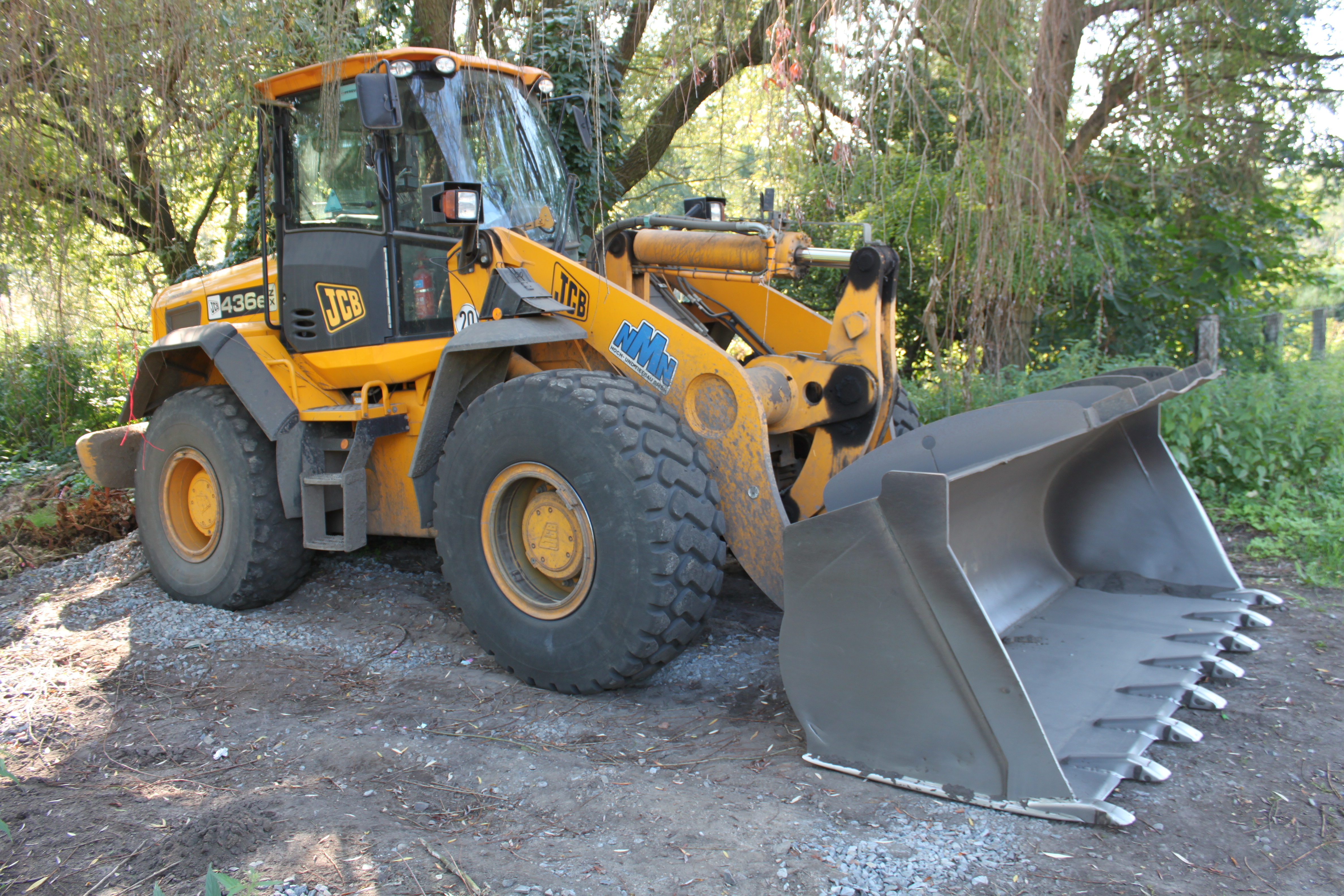 Ковшовый погрузчик. JCB 436. Фронтальный ковшовый погрузчик. Погрузчик одноковшовый JCB. Фронтальный погрузчик JCB С ковшом.