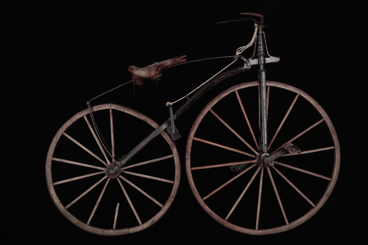 The Michaux velocipede had a straight fork and a [[spoon brake