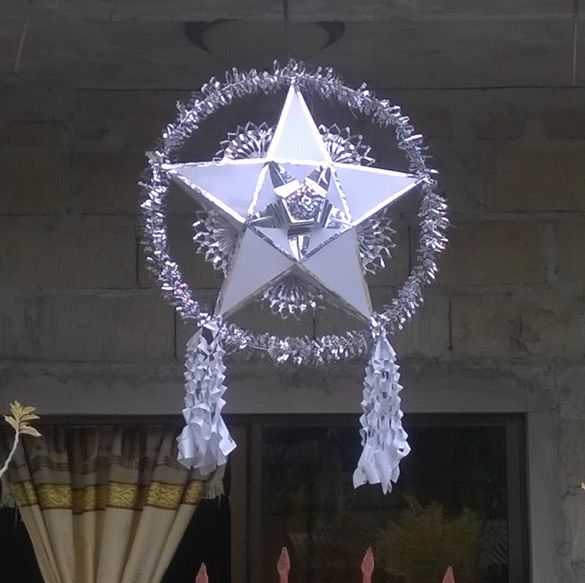 Barnstar on Philippine house as Christmas decoration