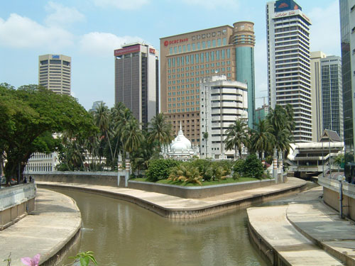 The Gombak River (left) merges with the Klang River (right) in Kuala Lumpur.
