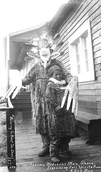 File:Aglegmiut shaman in costume, with boy, ca 1912 (THWAITES 115).jpeg