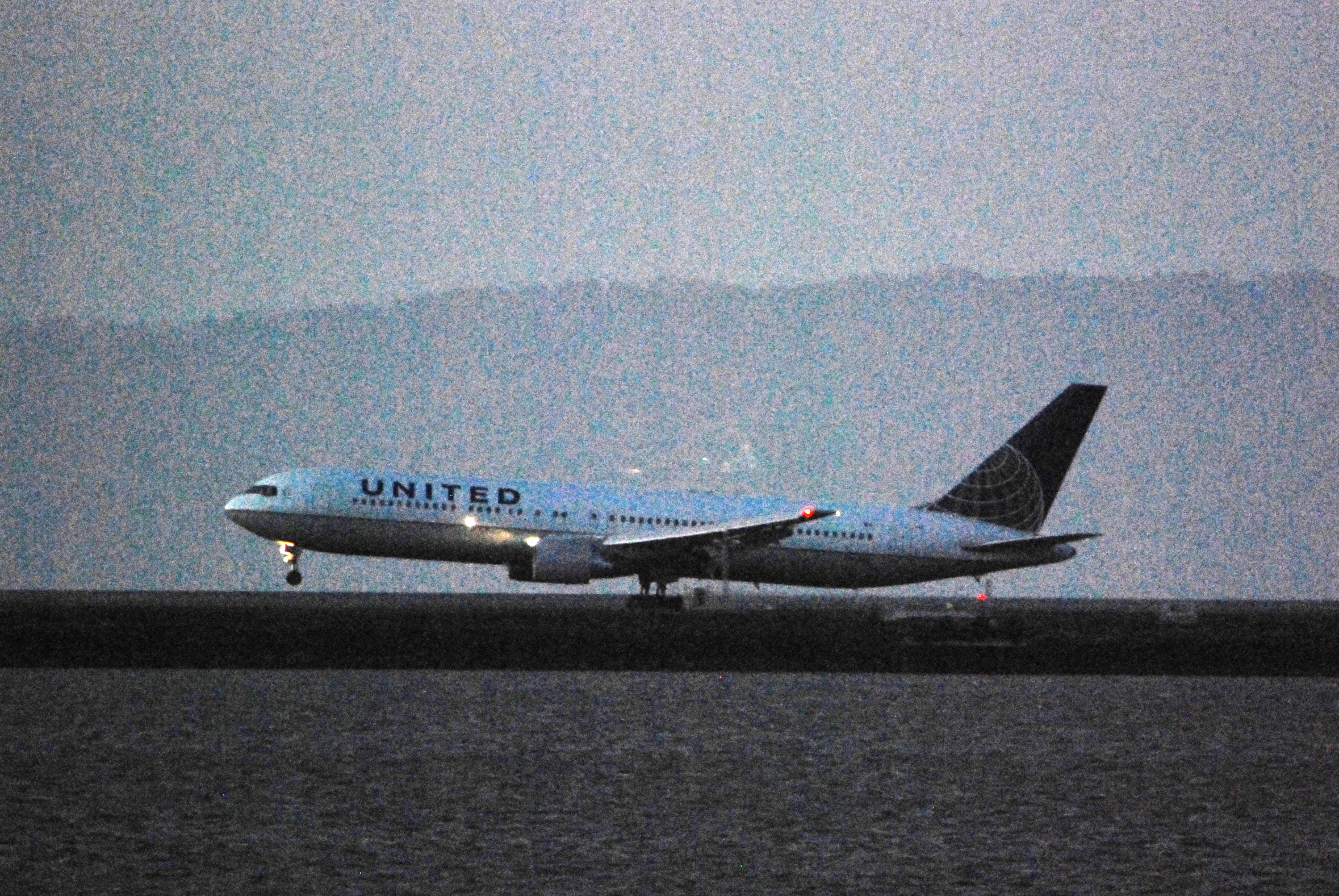 File:Boeing 767-300, United (post-merger colors) landing after