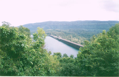 Koyna Dam: a) Picture of Koyna dam b) Typical NOF monolith section |  Download Scientific Diagram
