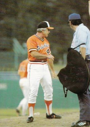 Weaver in 1977 with umpire Ken Kaiser