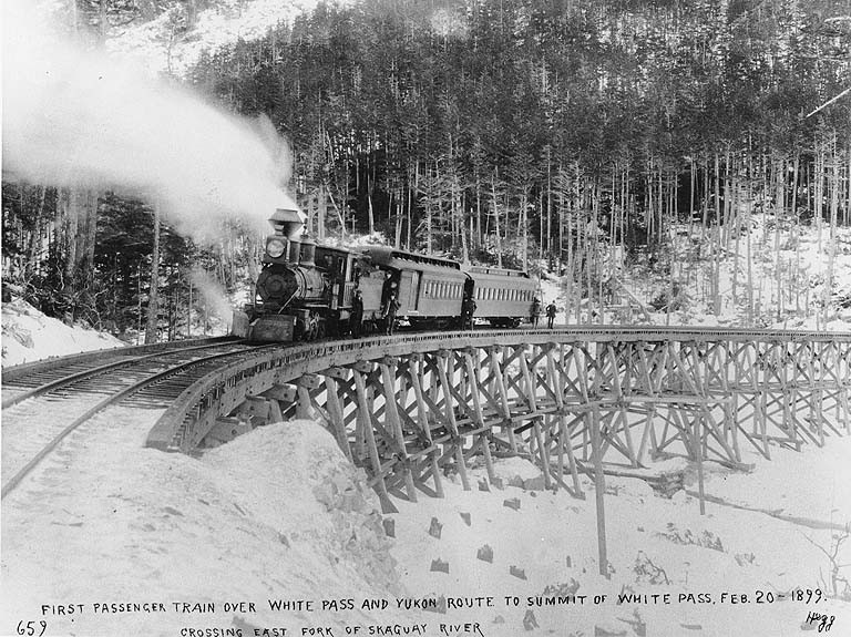 File:First passenger train of the White Pass & Yukon Railroad crossing the east fork of Skagway River en route to the summit of White (HEGG 711).jpeg