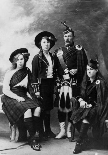 File:Four people in a variety of highland dress (3211449117).jpg