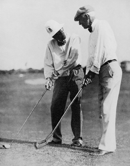 John D. Rockefeller playing golf. - NYPL Digital Collections