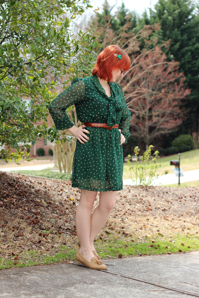 green dress with brown belt