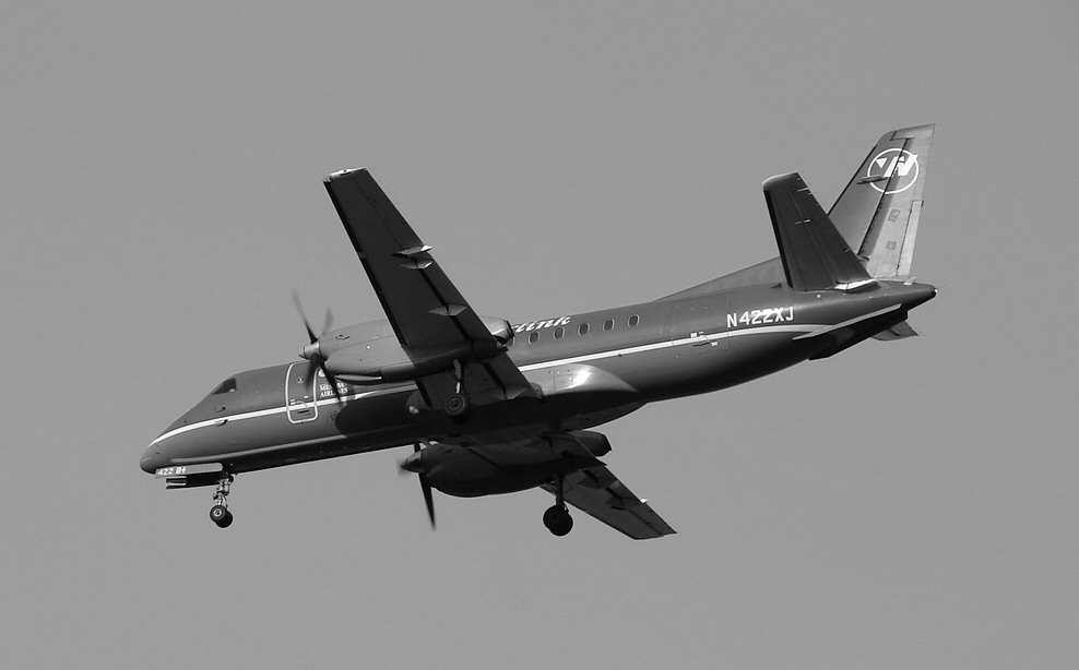 The Saab 340 in black and white (477306406).jpg