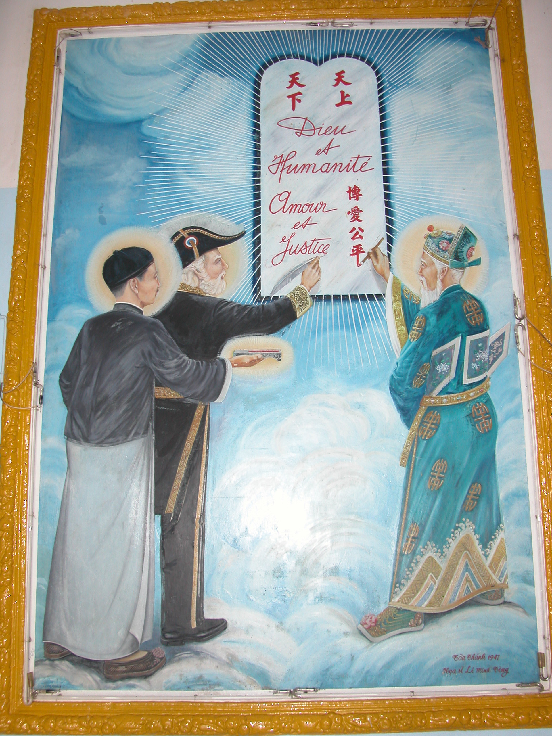 Cao_Dai_three_saints_signing_an_accord.jpg