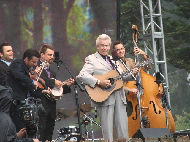 [[Ronnie McCoury]], [[Jason Carter (fiddler)|Jason Carter]], [[Robbie McCoury]], [[Del McCoury]], and [[Alan Bartram]] performing at the [[Hardly Strictly Bluegrass Festival]], [[San Francisco]], [[California]] in 2005.