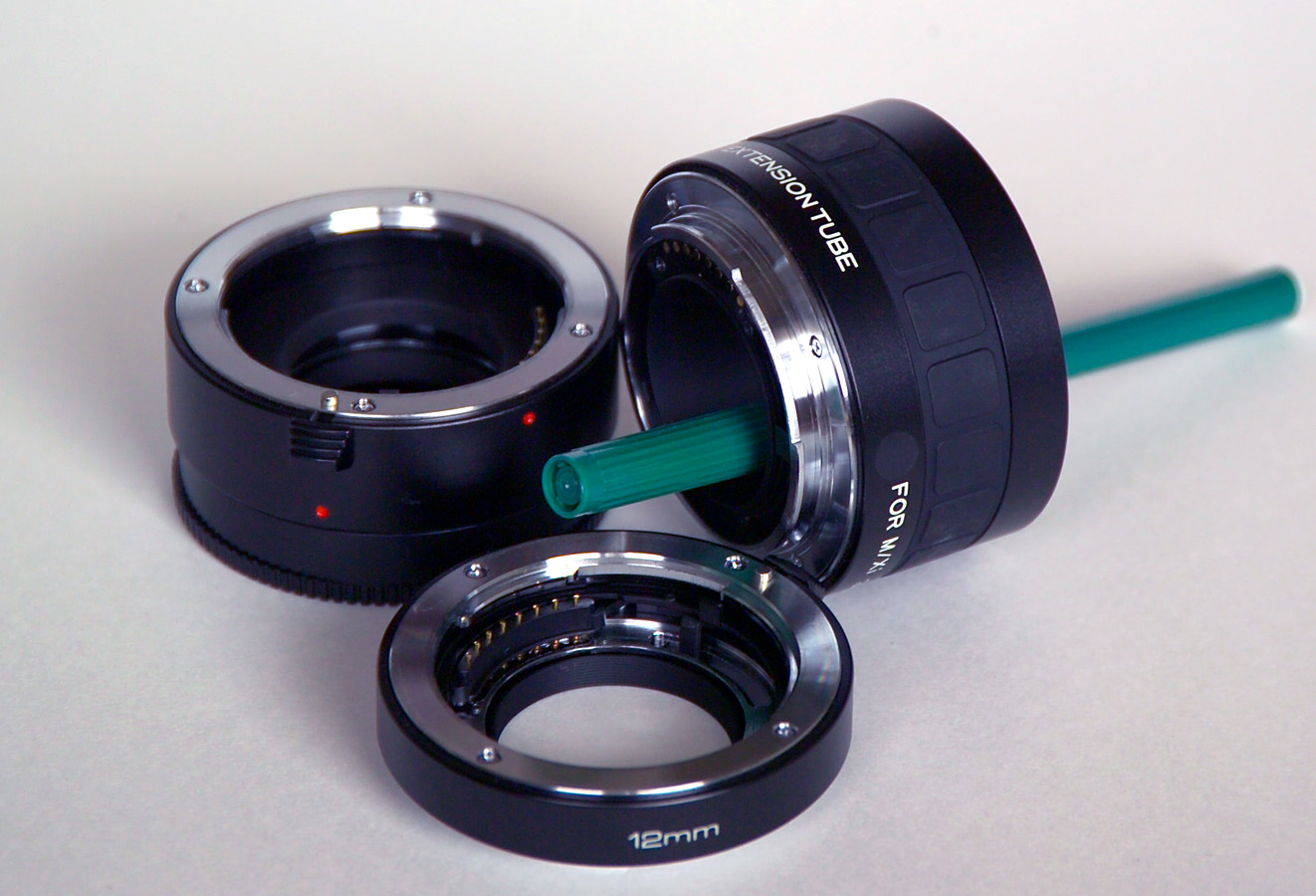 Three electronically enabled macro extension tubes