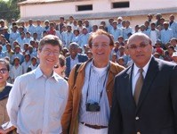 2006, Jeffrey Sachs with Pierpaolo Saporito, president of OCCAM and the Permanent Representative of Madagascar to the United Nations, Zina Andrianarivelo at the Sambaina ICT Village. In this occasion Sambaina was proclaimed Millennium Village by Jeffrey Sachs. Jeffrey Sachs con l'amabasciatore ONU, Zina Andrianarivelo, e Pierpaolo Saporito, presidente OCCAM - Osservaotrio per la comunicazione digitale al centro.jpg