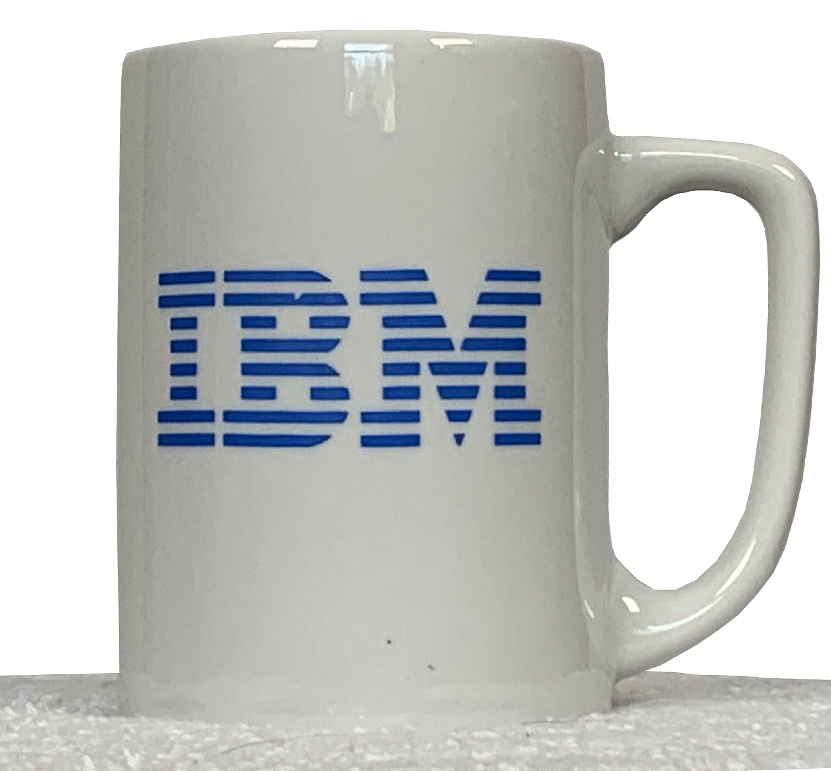 https://upload.wikimedia.org/wikipedia/commons/3/31/IBM_merchandising_coffee_mug_with_company_logo.jpg