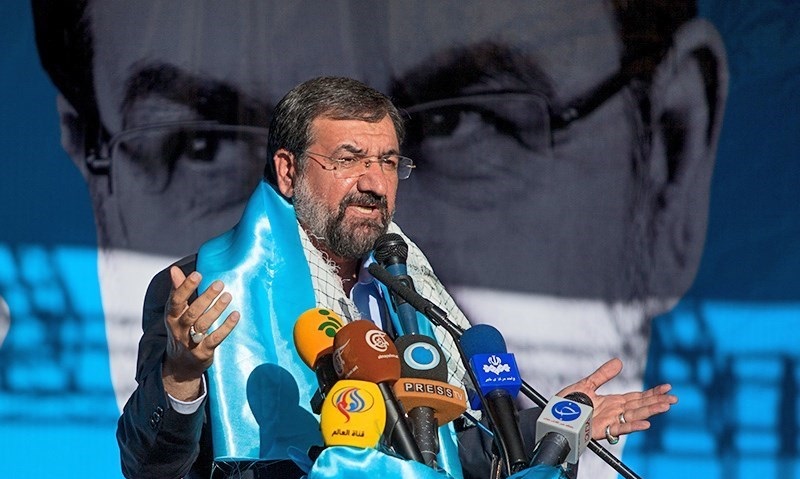 https://upload.wikimedia.org/wikipedia/commons/3/31/Mohsen_Rezaee_during_2013_election.jpg