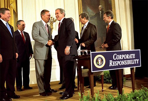 File:President George W. Bush shakes hands with Congressman Mike Oxley.jpg