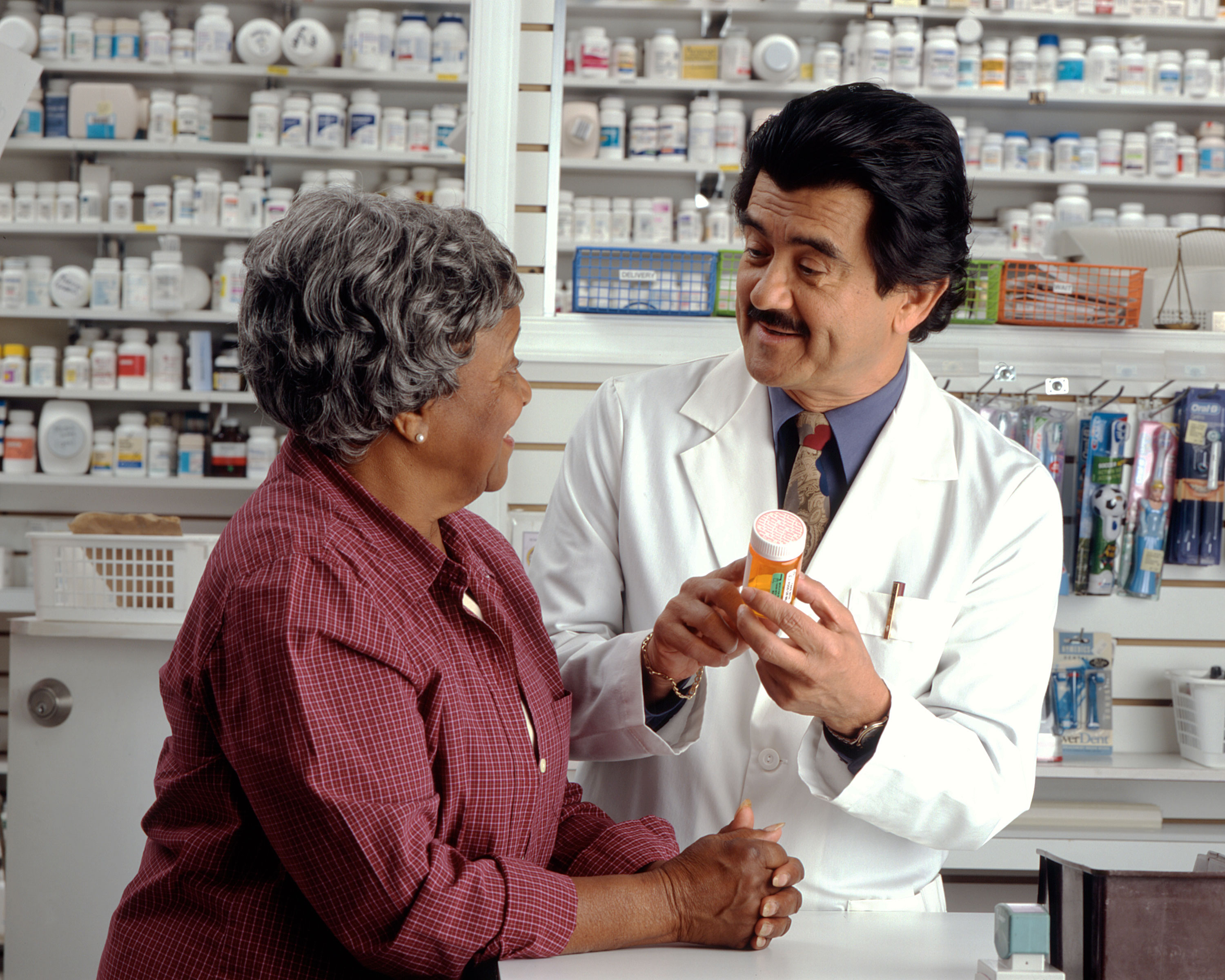 File:Woman consults with pharmacist.jpg - Wikimedia Commons