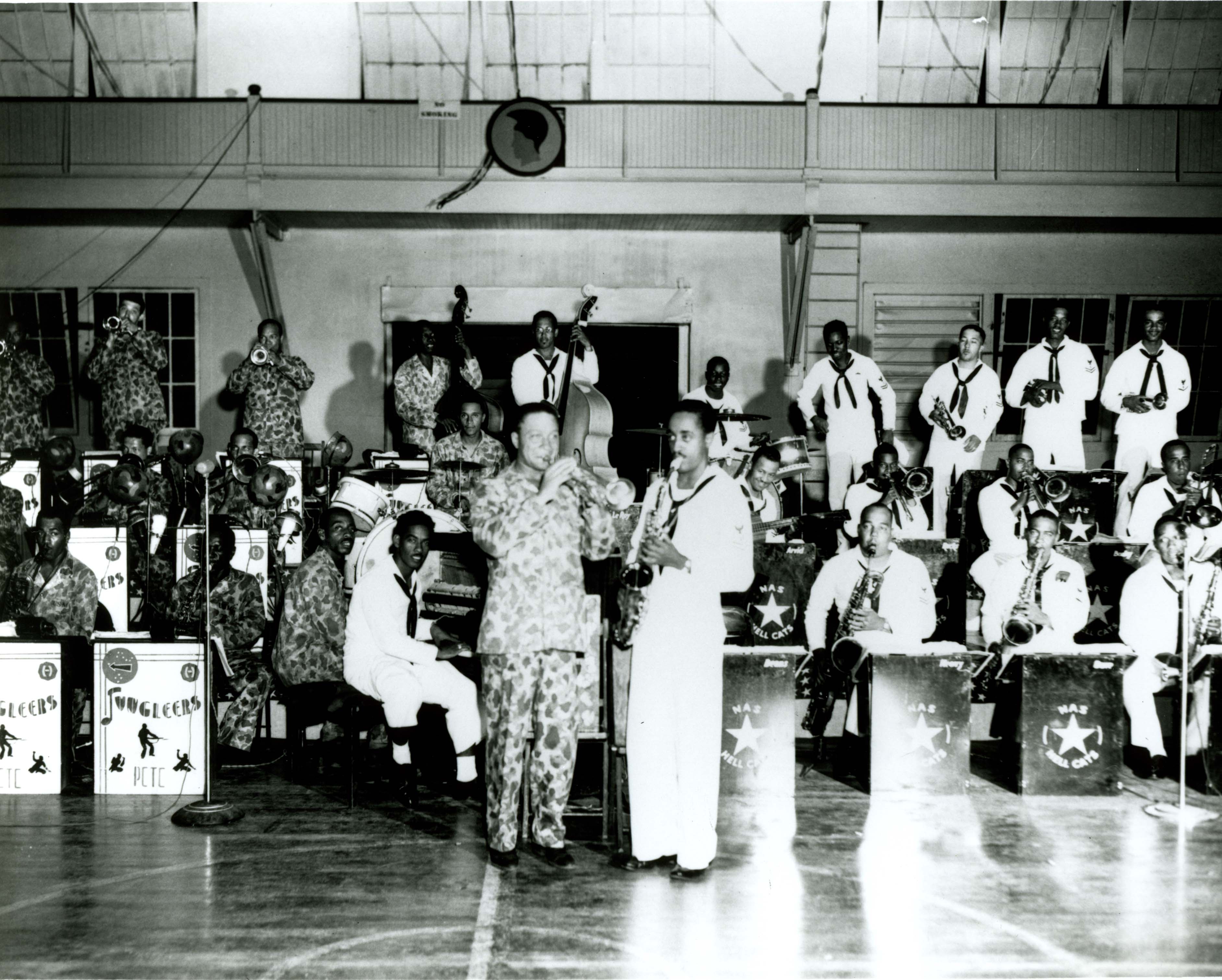 Army_and_Navy_Bands_at_a_War_Bond_Rally_in_the_Hawaiian_Armory_June_19%2C_1945.jpg