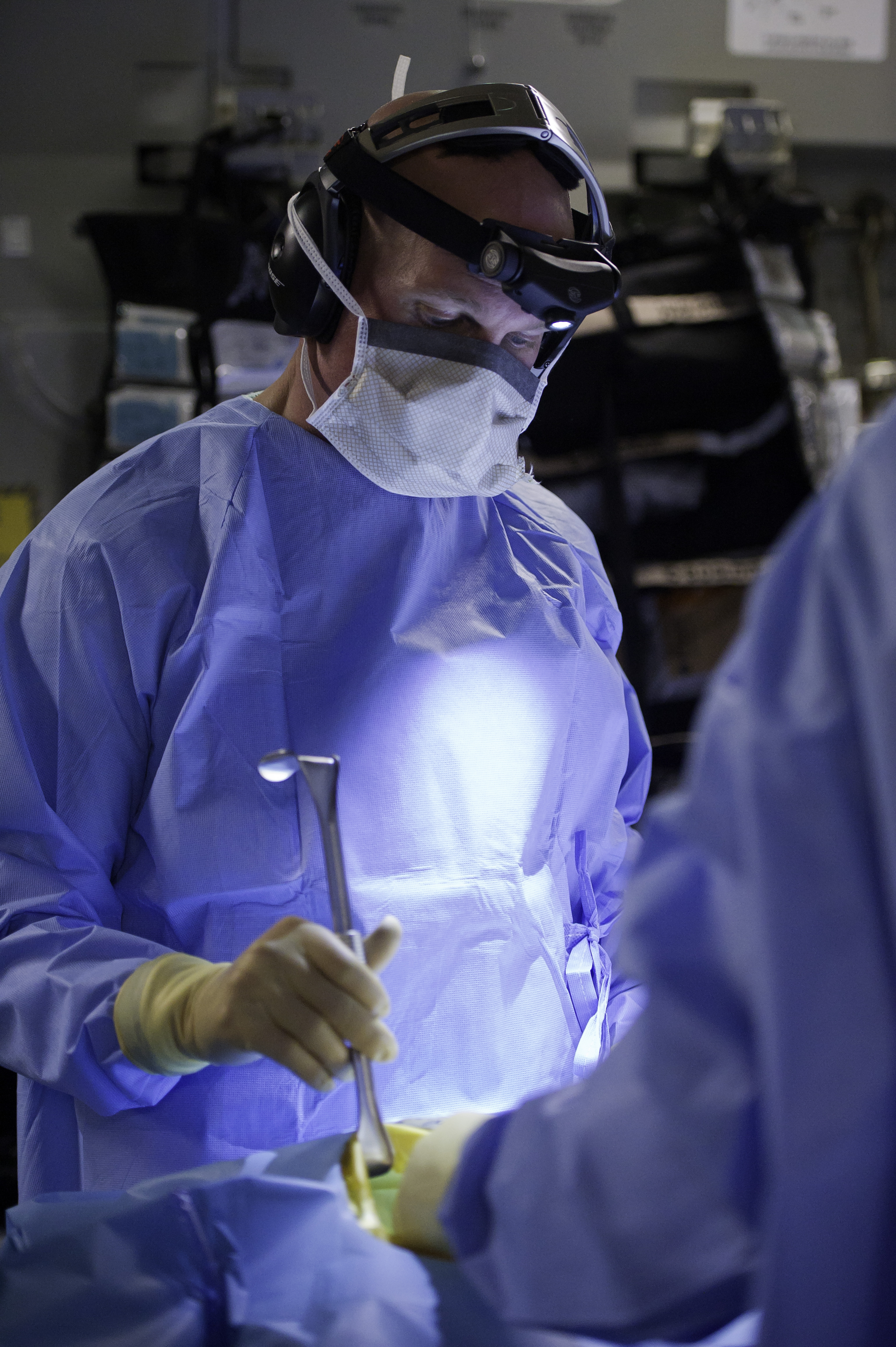 U.S. Air Force Lt. Col. Richard Degrosa%2C left%2C an emergency room doctor with the 86th Medical Group%2C performs a simulated exploratory laparotomy in flight surgery aboard a C 17 Globemaster III aircraft during 140117 F RW714 777