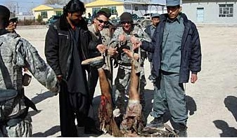 File:US army soldiers and Afghan police pose with a mangled corpse.jpg