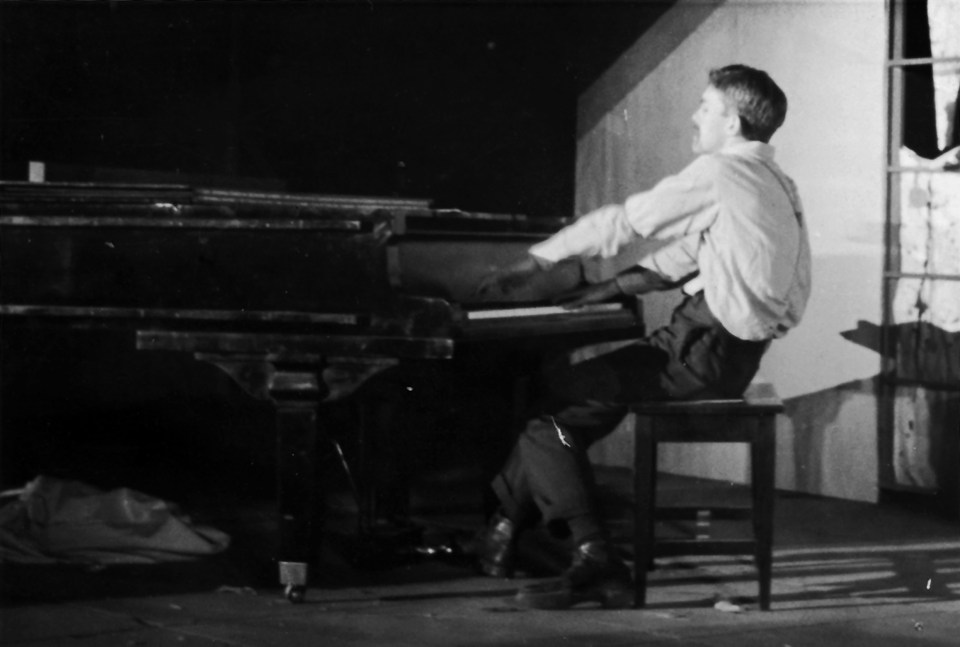 Bill Engvick playing piano in 1937.