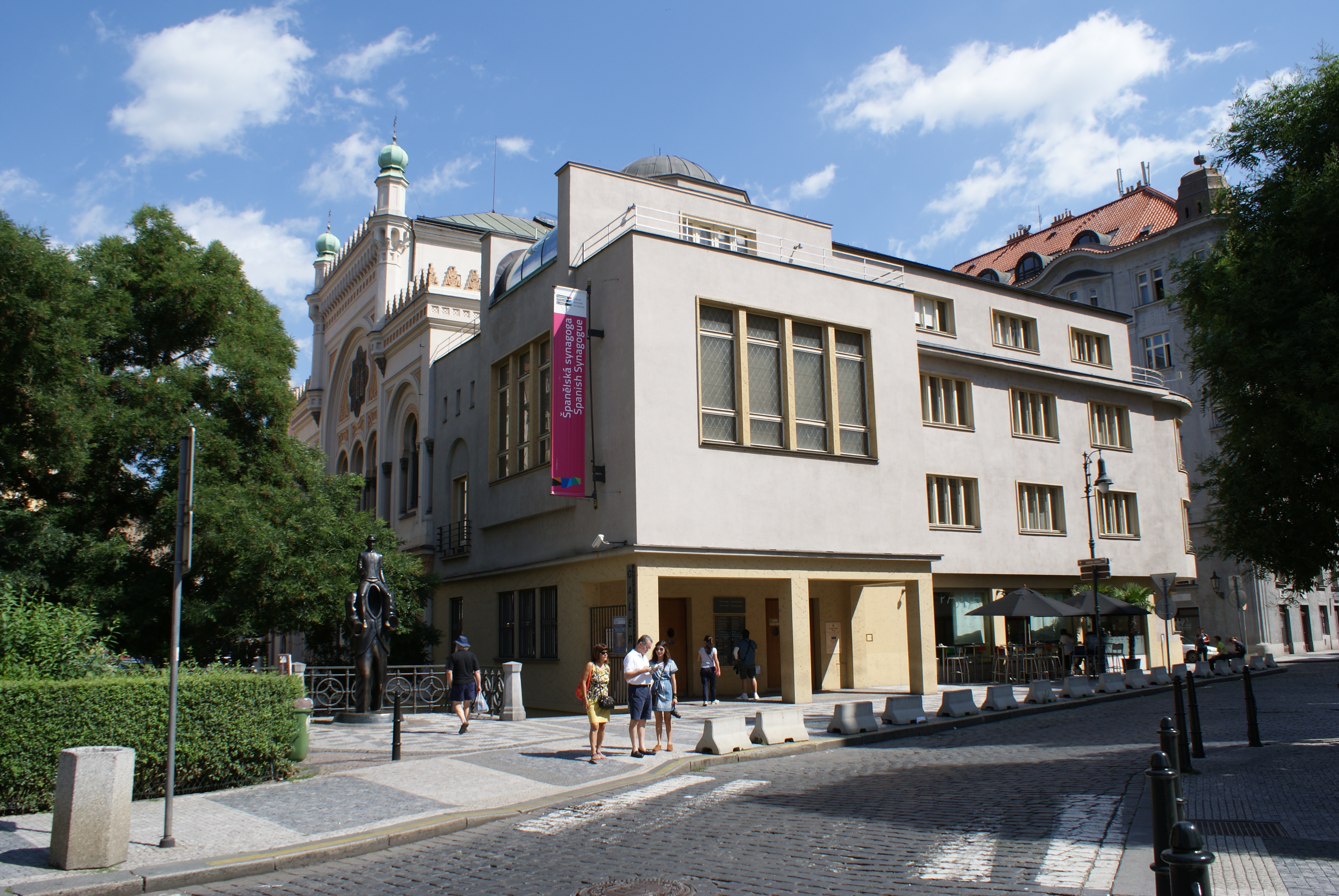 The Jewish Museum in Prague is housed in a [[Functionalism (architecture)|functionalist]] building, which was a former hospital adjacent to the Spanish Synagogue, one of the houses of worship in the synagogue's collection.