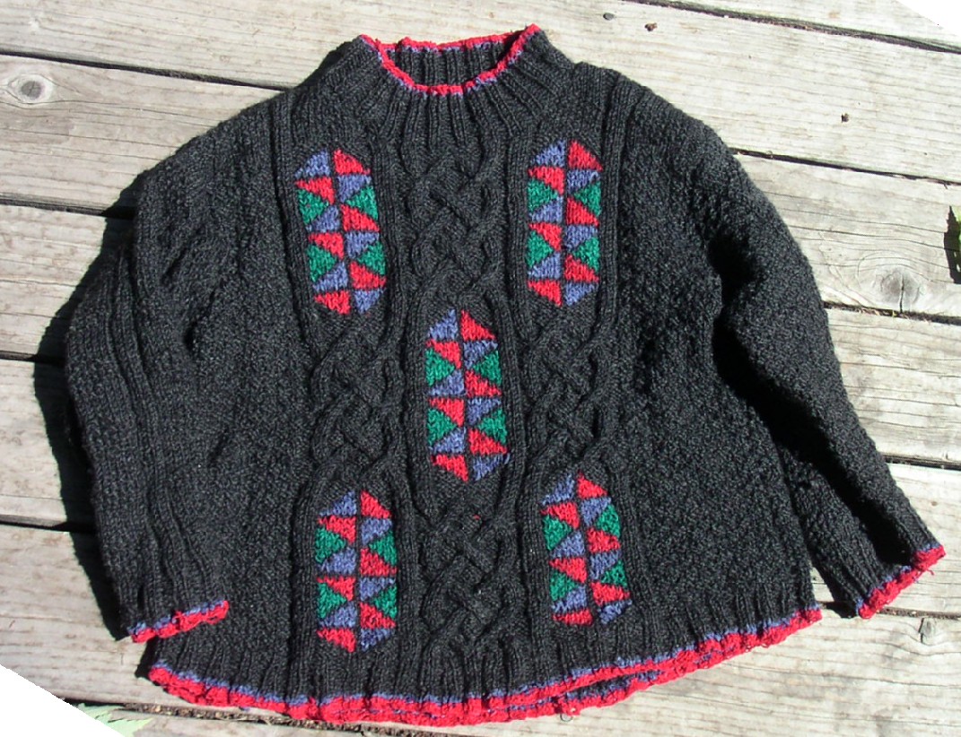 A design by Alice Starmore, ''Stained Glass Sweater'', based on [[Aran sweater