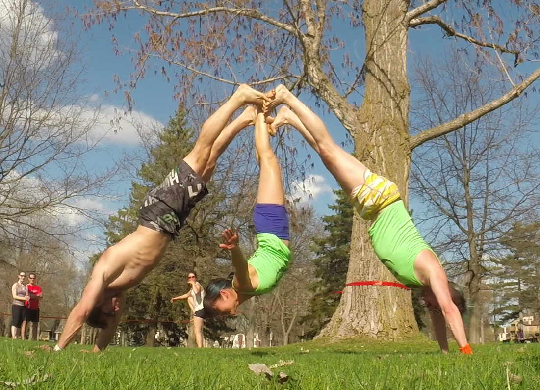 Three Person Foot to Foot Downward Dog with Foot Hang Flyer Acroyoga Pose