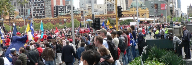 Some of the estimated 75,000 people who lined the streets of Melbourne for the 2006 AFL Grand Final parade Crowds at afl grand final parade.jpg