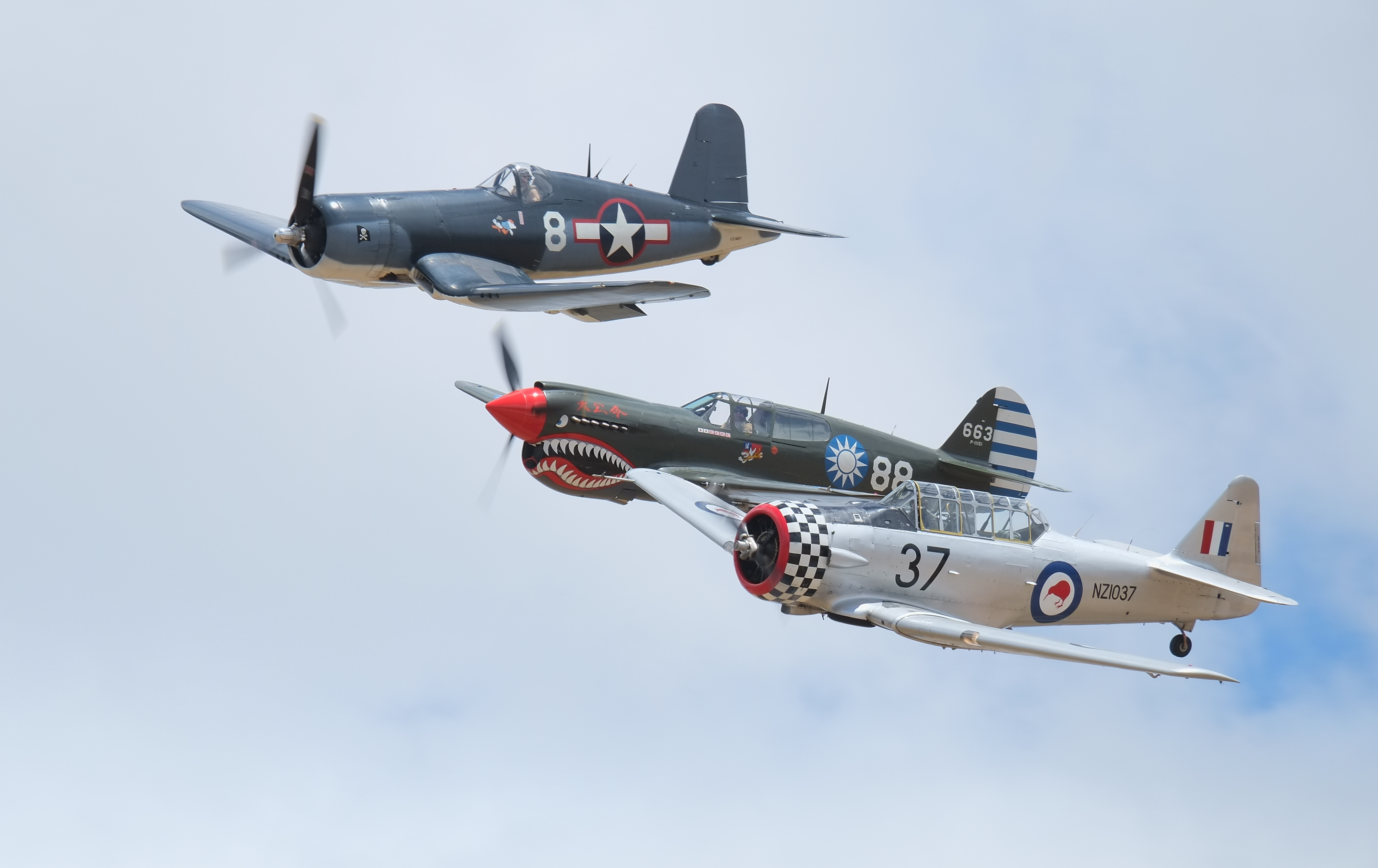 File:F4U Corsair and P-40 Kittyhawk and Harvard in formation