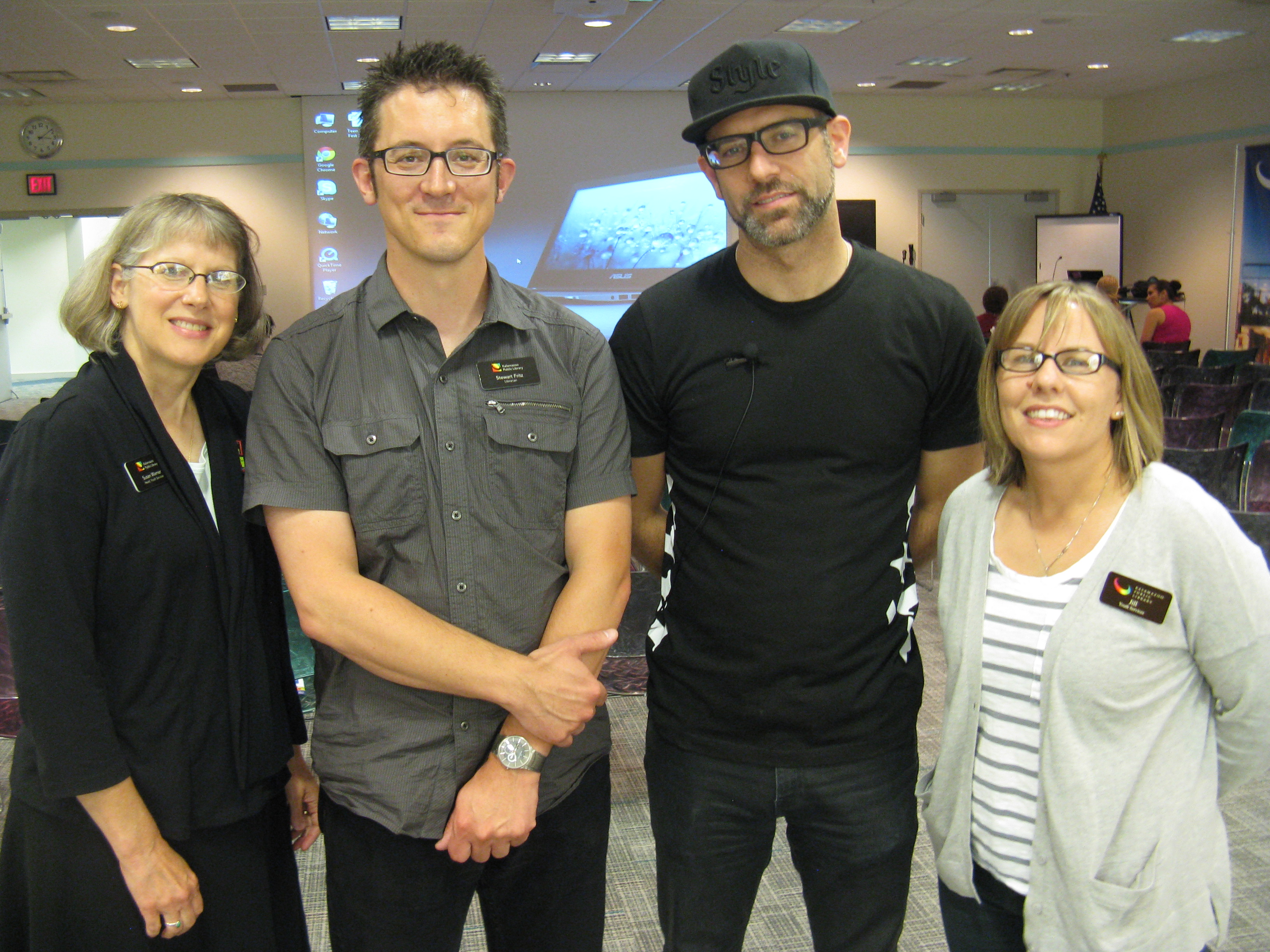 Kevin Coval (with cap) at the [[Kalamazoo Public Library