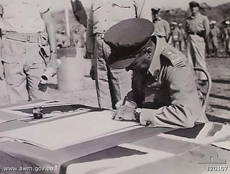 File:Yamada signing a document.jpg