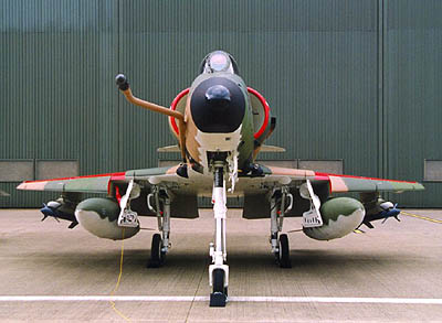 Head on profile of an A-4SU Super Skyhawk, note the cranked refuelling probe, the drooped leading edge slats as well as the ram-air intake. Also, inert AIM-9 Sidewinders painted in blue are carried on the outboard pylons.