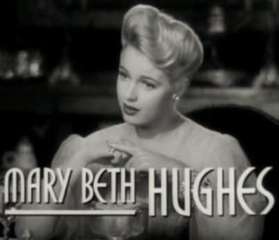 File:Mary Beth Hughes in Design for Scandal trailer.jpg