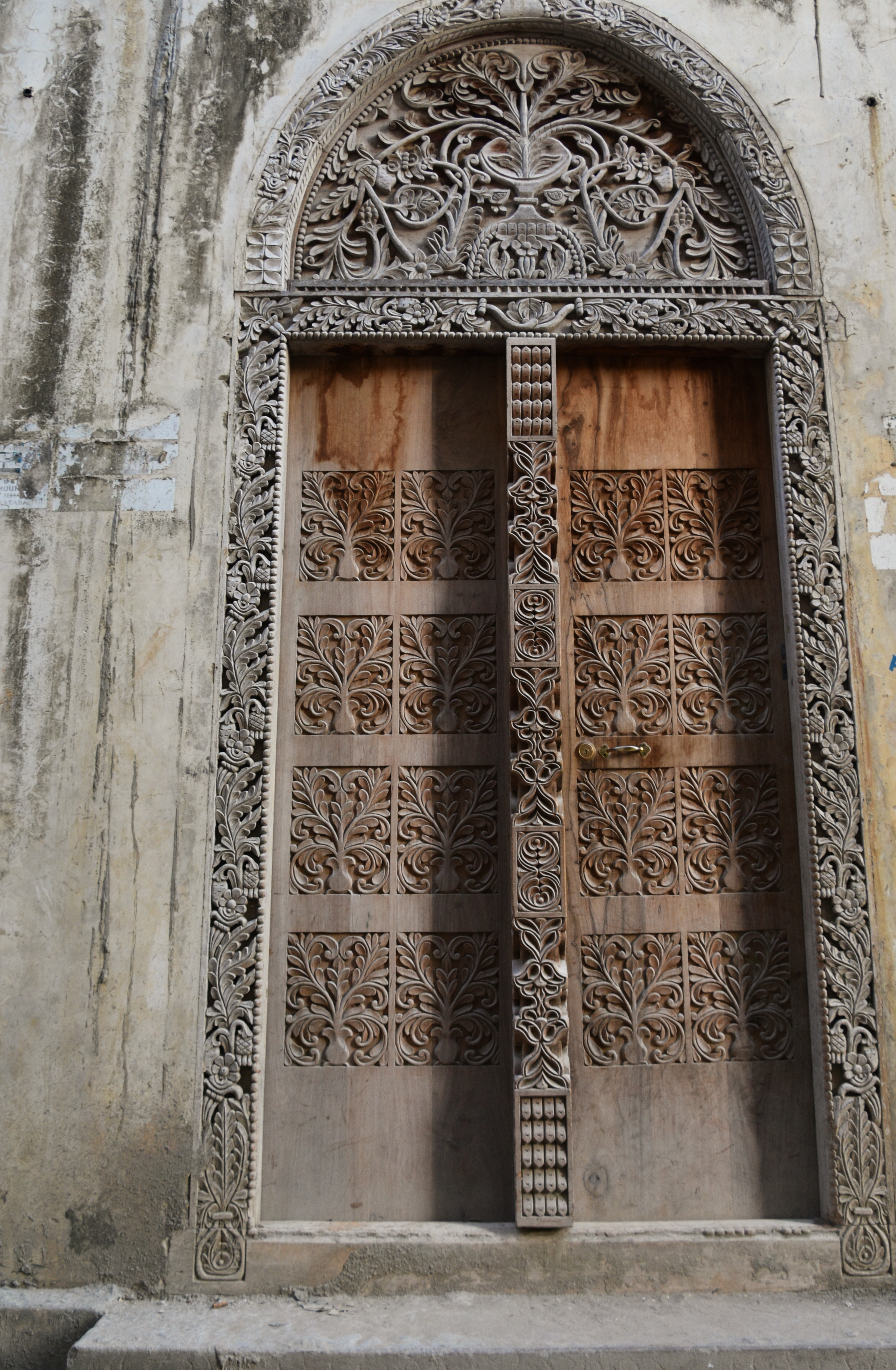 Decorated wooden door in a house in Stone Town, Stone Town, Zanzibar City