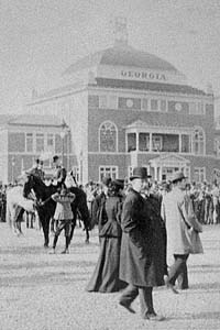 President Grover Cleveland walks past the Georgia Building at the 1887 Exposition. Grover Cleveland expo.jpg