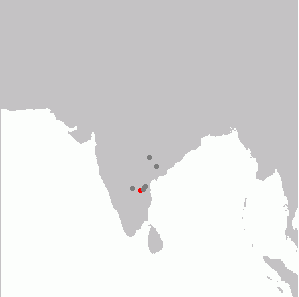 Specimen records in grey and current distribution in red.