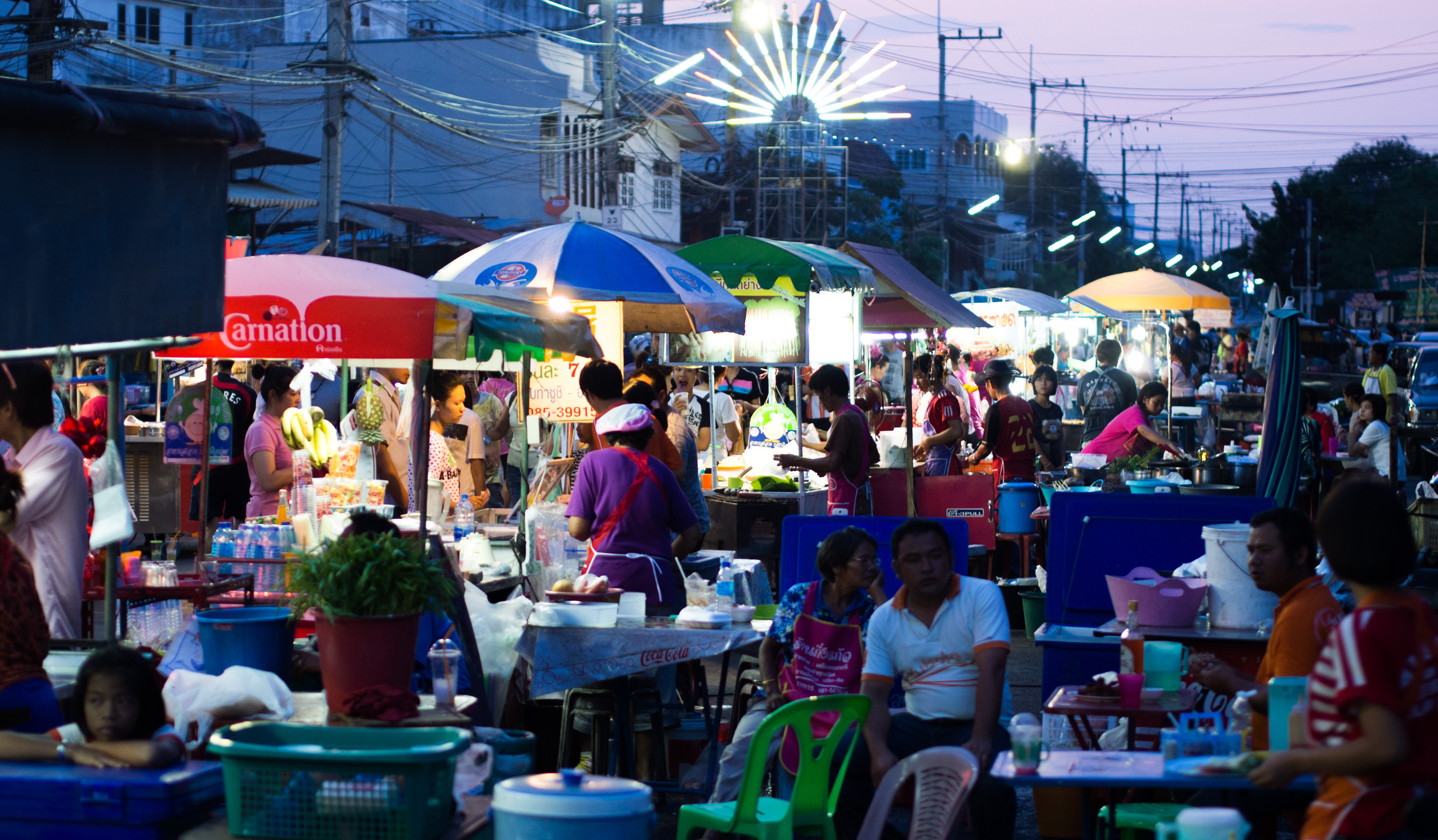 Street food in Thailand brings together various offerings of ready-to-eat meals, snacks, fruits and drinks sold by hawkers or vendors at food stalls or food carts on the street side in Thailand. Sampling Thai street food is a popular activity for visitors, as it offers a taste of Thai cooking traditions. Bangkok is often mentioned as one of the best places for street food. In 2012, VirtualTourist named Bangkok as the number one spot for street food—the city is notable for both its variety of offerings and the abundance of street hawkers.There are many areas in Bangkok that are famous for as a street food center such as Yaowarat and nearby area (Talat Noi, Wat Traimit and Chaloem Buri), Nang Loeng, Sam Phraeng, Pratu Phi, Bang Lamphu, Kasat Suek, Sam Yan, Tha Din Daeng, Wongwian Yai, Wang Lang, Talat Phlu.