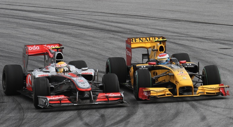 File:Lewis Hamilton overtaking Vitaly Petrov 2010 Malaysia (cropped).jpg